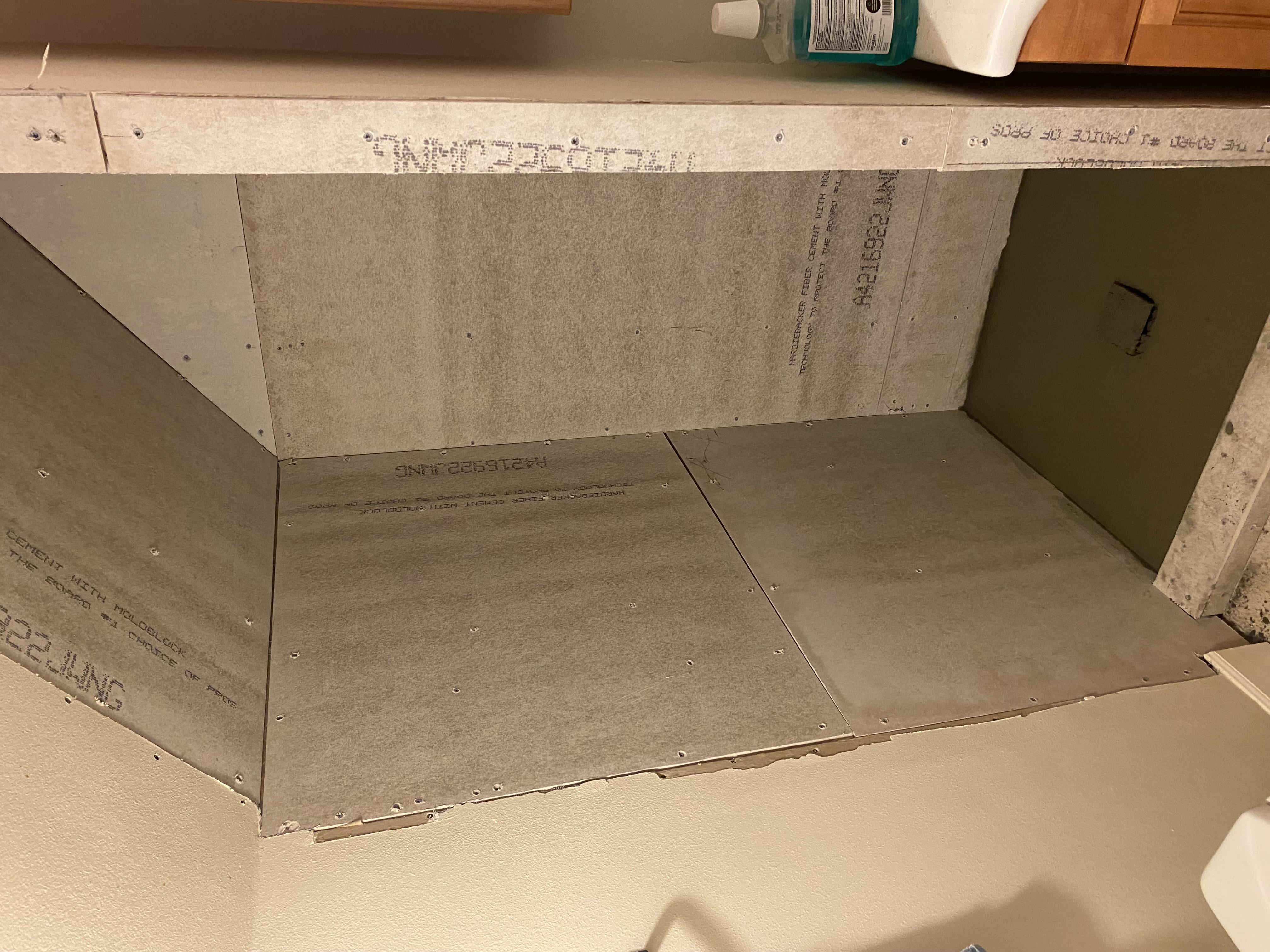 Cracked damaged bathroom tiles before repair service in Seattle WA